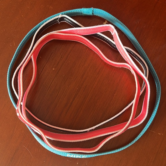 4 like new condition under Armour/Nike athletic headbands - Picture 6 of 6